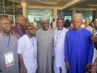 CONUA members with labour minister Maigari Dingyadi