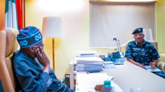 President Bola Tinubu and Kayode Egbetokun, the inspector-general of police