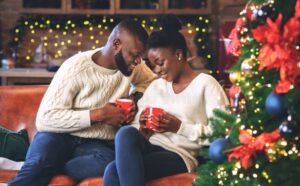 Black couple in relationship celebrating Christmas