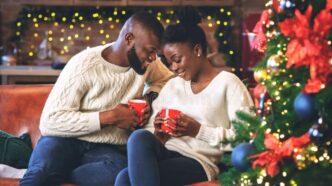 Black couple in relationship celebrating Christmas